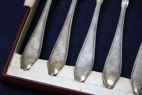 A cased set of twelve pairs of Swedish silver dessert eaters